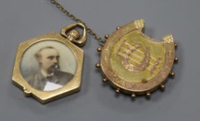 An early 20th century 15ct gold hexagonal portrait locket by M.B & Co, with hinged border and a