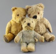 A 1960's Merrythought bear and two English bears, tallest 15in.