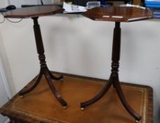 A pair of octagonal tripod tables W.49cm