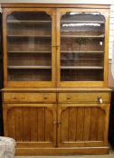 A Victorian ash bookcase / cupboard W.156cm