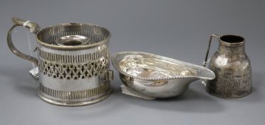 A George III silver pap boat, a plated candle holder and a Middle Eastern small metal jug.