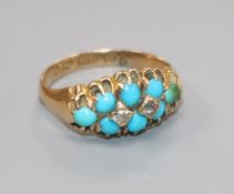 An early 20th century 15ct gold, turquoise and diamond set cluster dress ring, size N/O.