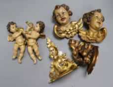 Four cherub appliques and two Italian gilt brackets