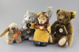 A Steiff collector's bear, a Steiff cat, a rabbit and a lion