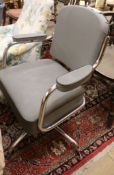 A 1950's grey leatherette and chrome chair