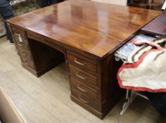 A 1950's mahogany partner's desk W.159.5cm
