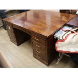 A 1950's mahogany partner's desk W.159.5cm