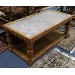 An oak and fossil marble coffee table W.135cm