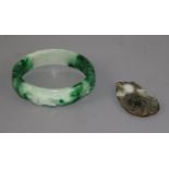 Jade bangles and a jade pendant