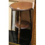 A mahogany tripod stool W.38cm