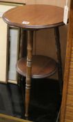 A mahogany tripod stool W.38cm