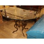 A bronzed metal glass top centre table W.220cm