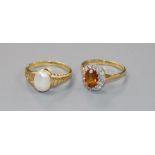 Two 18ct gold and gem set rings including baroque pearl and citrine and diamond.