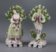 A pair of Chelsea porcelain figures of a gallant and companion