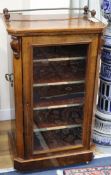 An Edwardian walnut music cabinet W.54cm