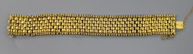 A 15ct gold brick link bracelet, 15.5cm.