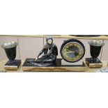 A Deco bronzed metal figural clock garniture