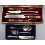 Robert A. Paton stag antler handled carving set and a cased plated set