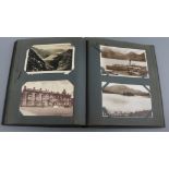 A postcard album containing approximately 205 black and white UK and Alpine cards, mainly 1930's-