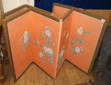 A pair of Chinese four fold screens, painted with peonies W.180cm