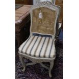 A set of four Louis XVI design caned chairs