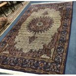 A Tabriz blue ground carpet 294 x 197cm