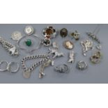 A small group of silver and other jewellery including bracelets, rings, earrings etc.