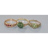 An early 20th century 15ct gold and gem set ring and two other 9ct gem set rings.