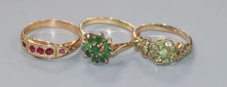 An early 20th century 15ct gold and gem set ring and two other 9ct gem set rings.