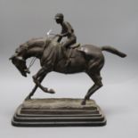 After Mene. A bronze jockey and rider, signed height 33cm