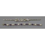 A white metal and moonstone bracelet and a 9ct gold amethyst and cultured pearl bracelet.