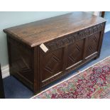 A 17th century oak coffer W.118cm