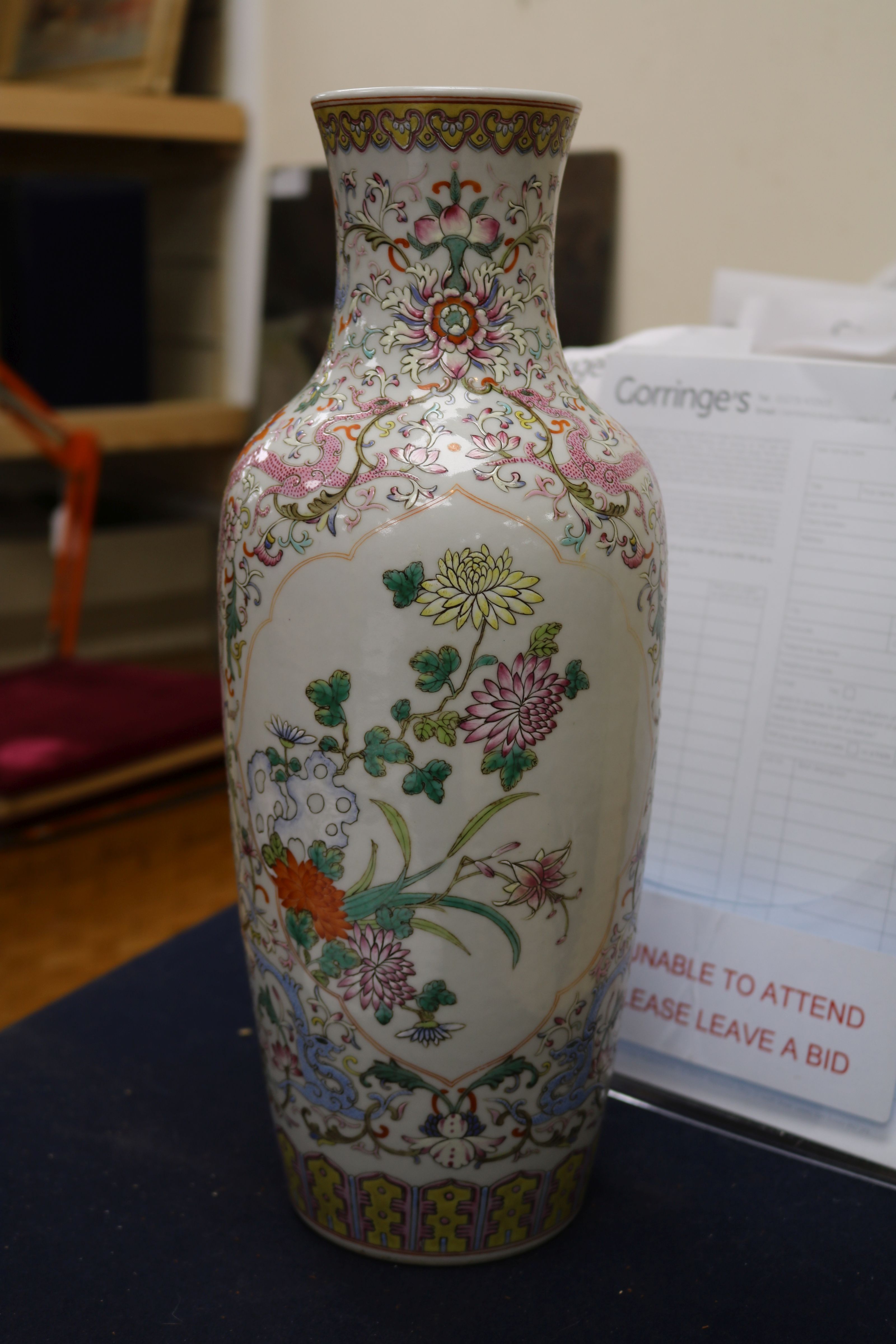 A Chinese famille rose baluster vase, painted with chrysanthemums amid rockwork, on a ground painted - Image 6 of 7