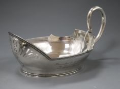 A late 19th/early 20th century Russian 84 zolotnik presentation dish modelled as a kovsh? 27.3cm,