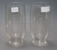 A pair of Baccarat acid etched glass vases height 20cm