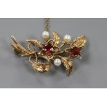 A gold, garnet and pearl spray brooch. gross 8.2 grams