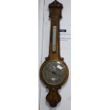 Dan Robinson, Bradford. A Victorian walnut wheel barometer W.32cm
