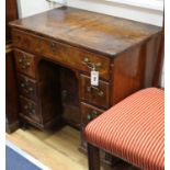 A George II walnut kneehole desk W.76cm