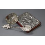 A late Victorian ornate silver bangle (a.f.), a silver mounted day book and a Dutch white metal