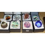 Eight paperweights including Caithness