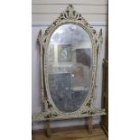 A cream and gilt painted overmantel mirror W.91cm