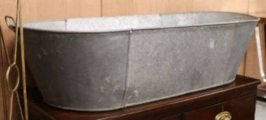 A vintage zinc bath W.121cm