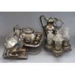 A quantity of plated silver including a teapot, mini coal scuttle etc
