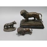After Valton. A bronze of a lion, a smaller lion and a spelter lioness tallest 21cm