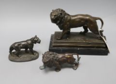 After Valton. A bronze of a lion, a smaller lion and a spelter lioness tallest 21cm