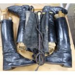 Two pairs of riding boots and trees and a stag antler handled riding crop