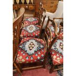 Five George III pierced ladder back chairs