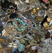 A large quantity of assorted costume jewellery.