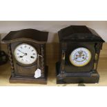 A French slate and enamel mantel clock by S Marti & cie Medaille and a German oak mantel clock