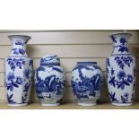 A pair of Chinese blue and white jars and cover and a pair of blue and white vases